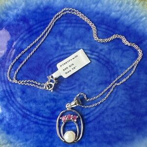 Chic Oval Silver Necklace with Rubies and a white pearl Accent
